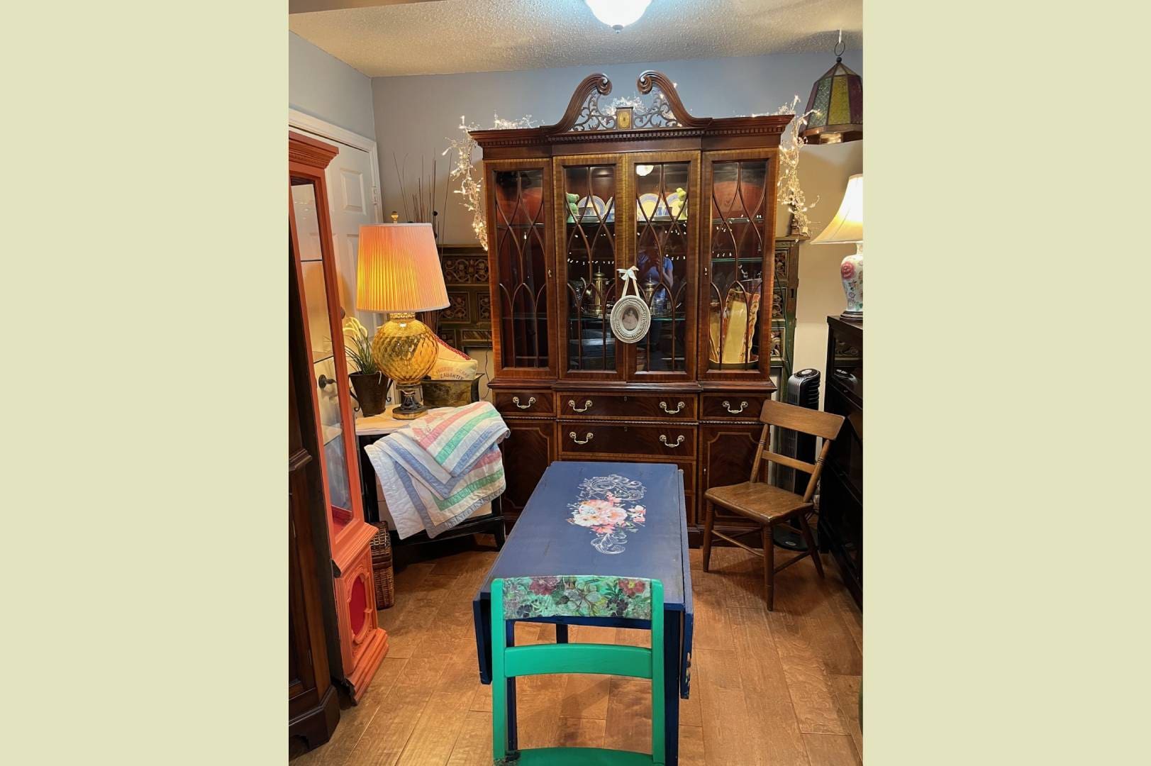 Antique wooden hutch in a living room.